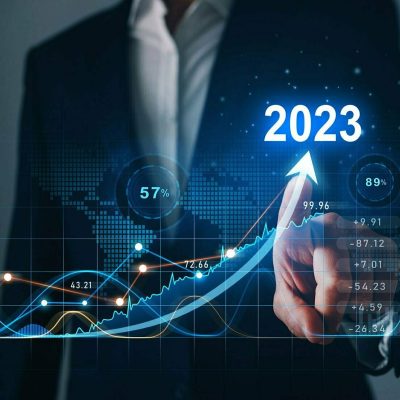 Businessman draws increase arrow graph corporate future growth year 2022 to 2023. Planning,opportunity, challenge and business strategy. New Goals, Plans and Visions for Next Year 2023